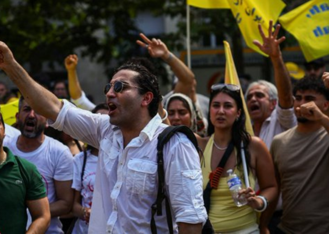 Paris Police Arrest 20 at Banned Iran Opposition Rally Paris Police Arrest 20 at Banned Iran Opposition Rally